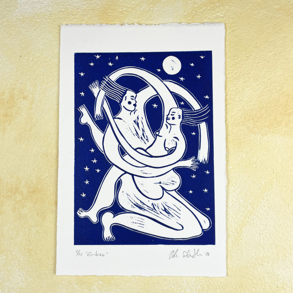 Blue linocut "Embrace", two figures tenderly holding each other in a fluid, harmonic hug