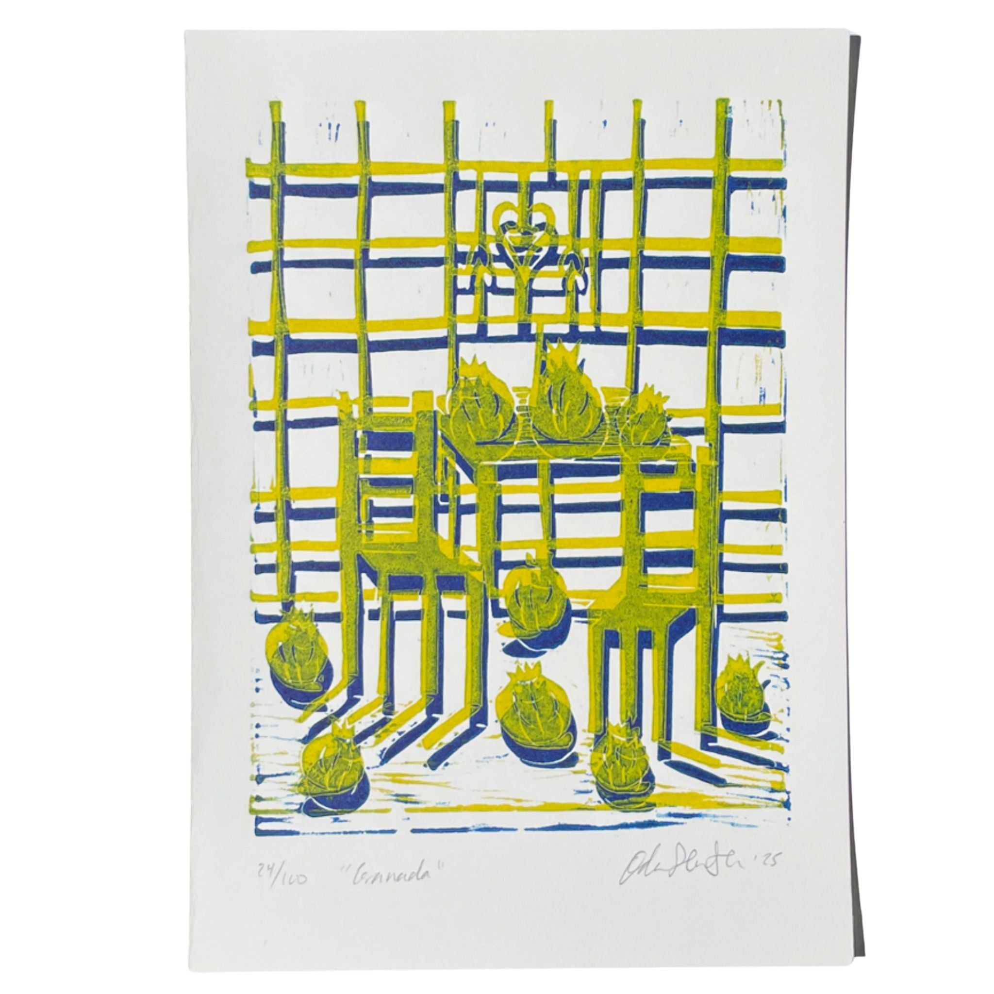 Still-life linocut "Granadas" with pomegranates on a kitchen table and chequered tiled wall in yellow and blue
