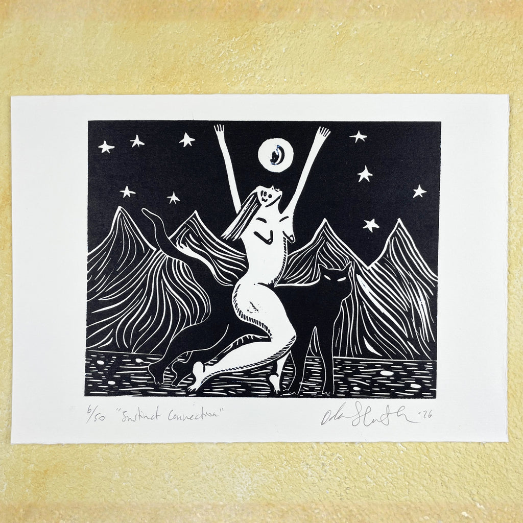 Black and white illustration of a woman riding a panther with mountains and stars on a cream-coloured background