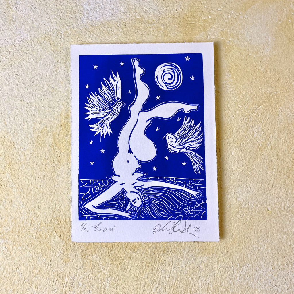 Blue figurative linocut "Lazara", a woman falling toward the ground with birds and a moon