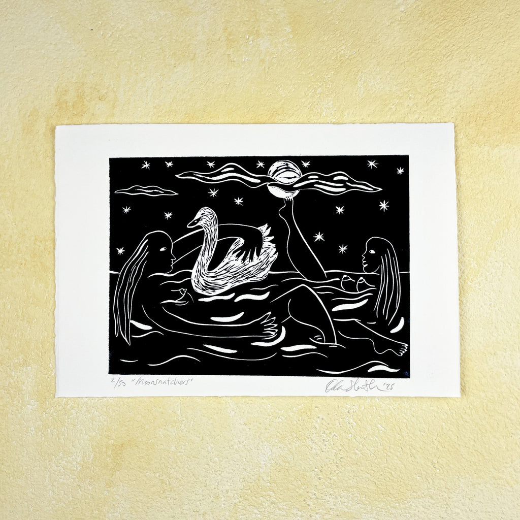 Black linocut "Moonsnatchers", two women bathing in water with a swan in peaceful harmony