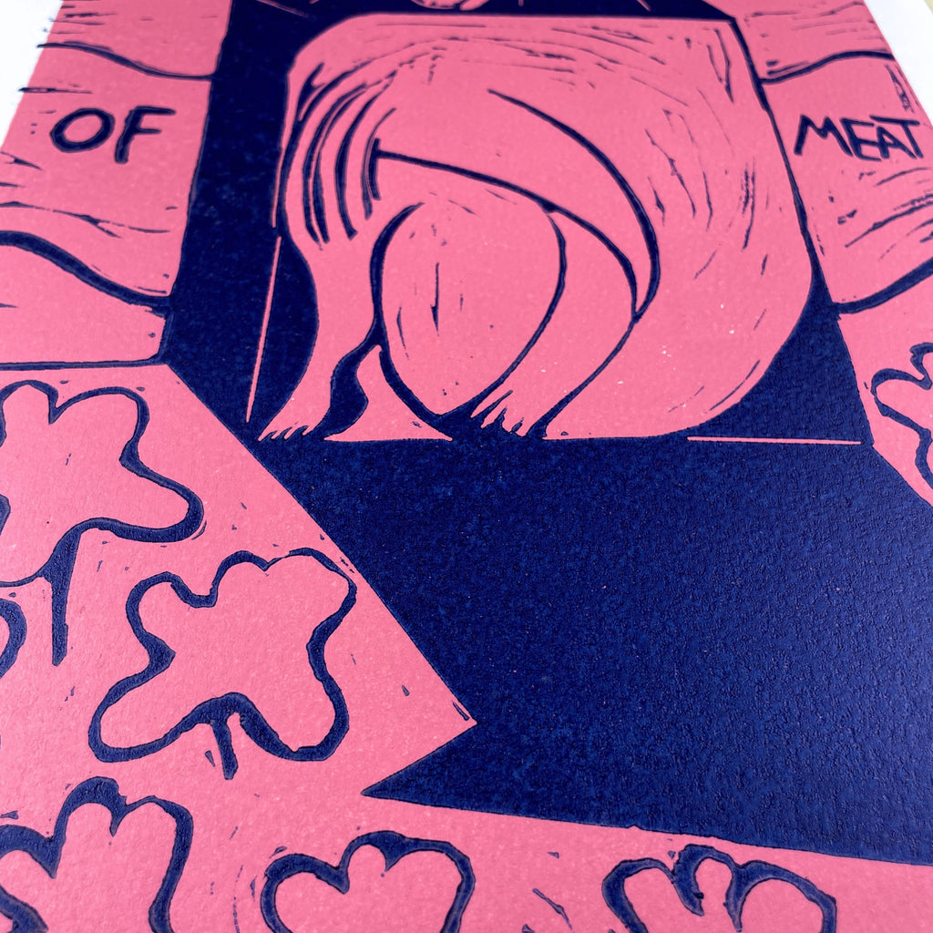 Close-up of "Just a Piece of Meat", a woman filling a tiny house with title text, pink and blue linocut 