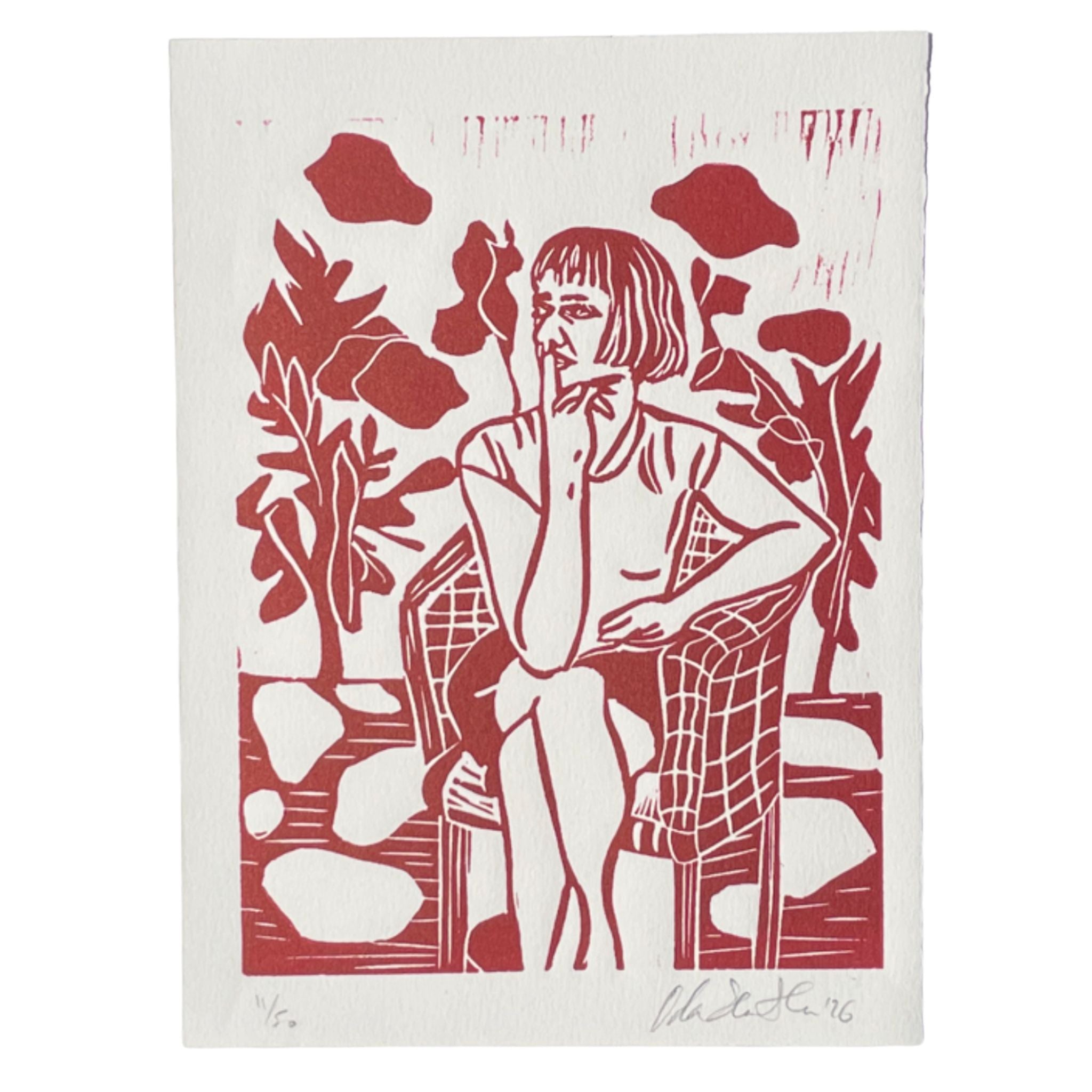 Dark red linocut portrait "Woman Thinking", a contemplative woman seated in a chair surrounded by plants