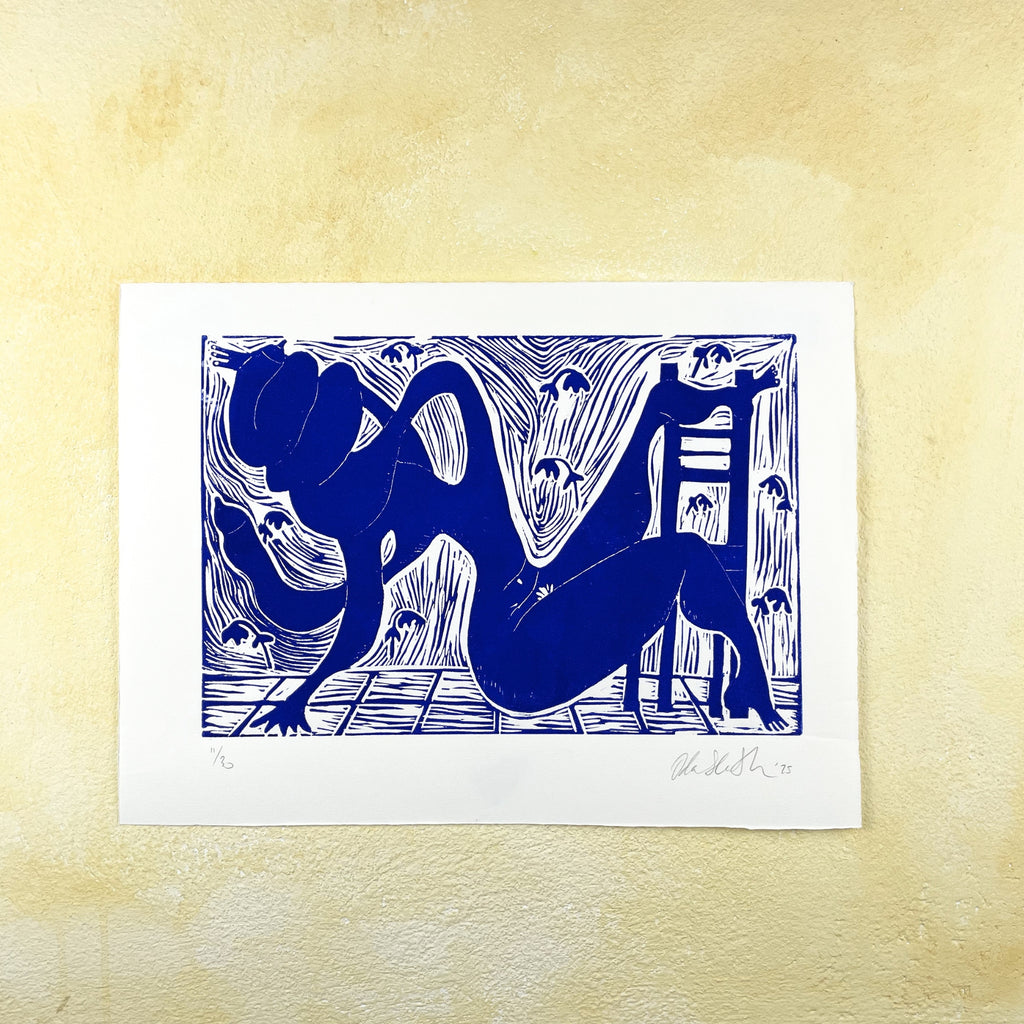 Ultramarine blue figurative linocut "Twisted" of a nude body turning in a room with a chair