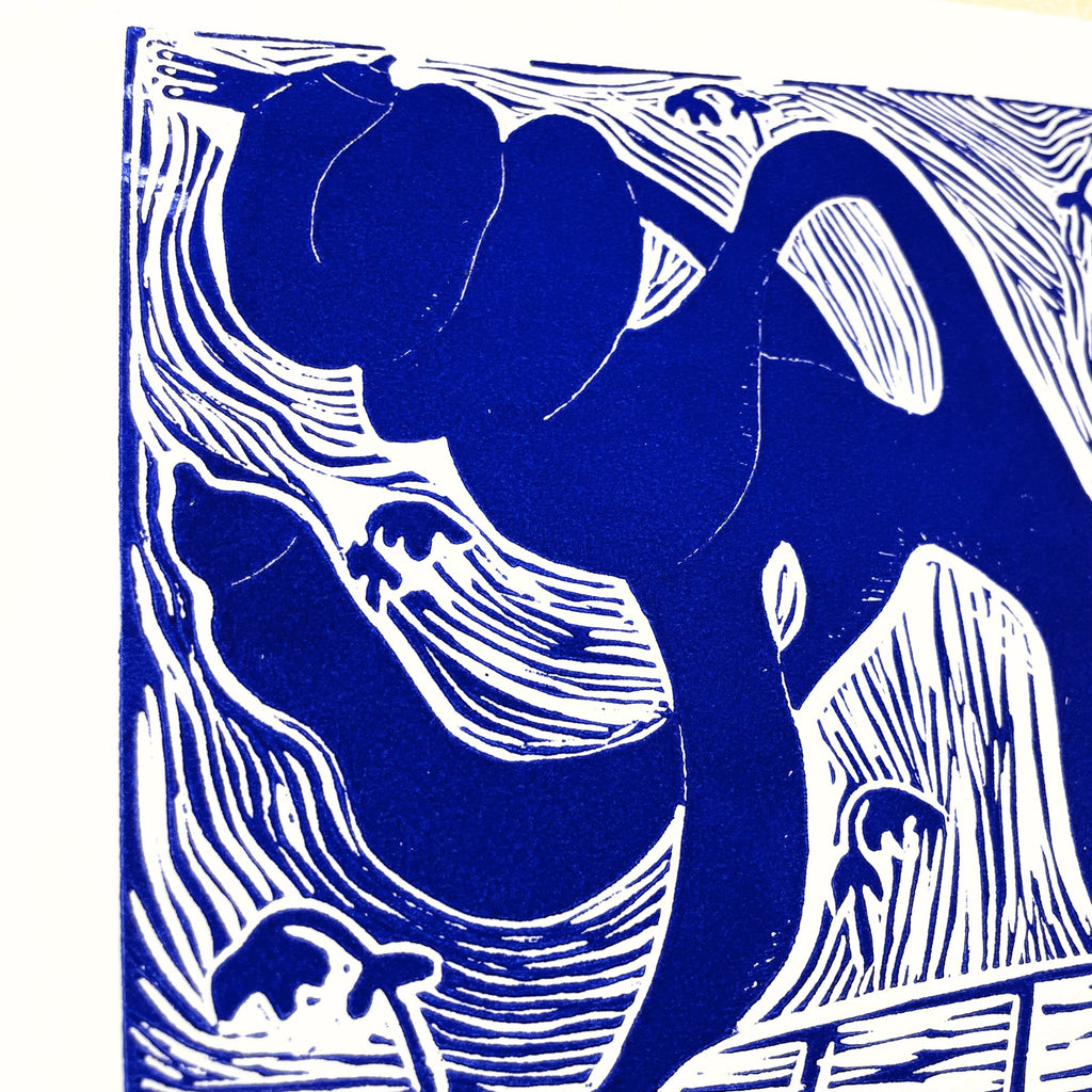 Blue and white abstract design with animal shapes on a blue background